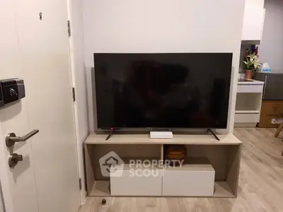 Modern living room with sleek TV setup and stylish decor