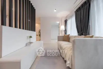 Modern living room with elegant sofa and stylish decor