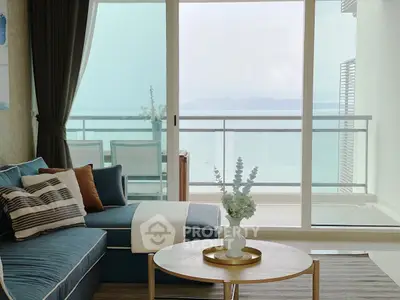 Luxurious living room with stunning ocean view and elegant decor