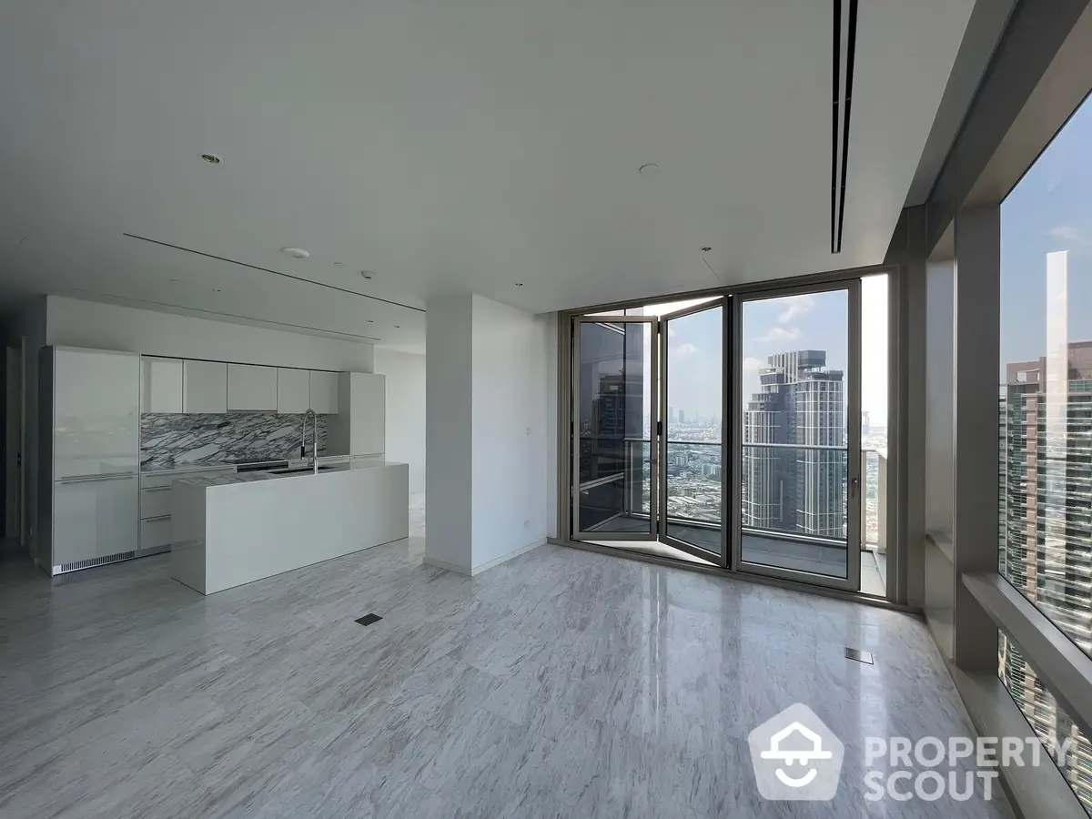 Spacious high-rise apartment with open layout kitchen, floor-to-ceiling windows, and stunning city views, featuring marble flooring and modern finishes.