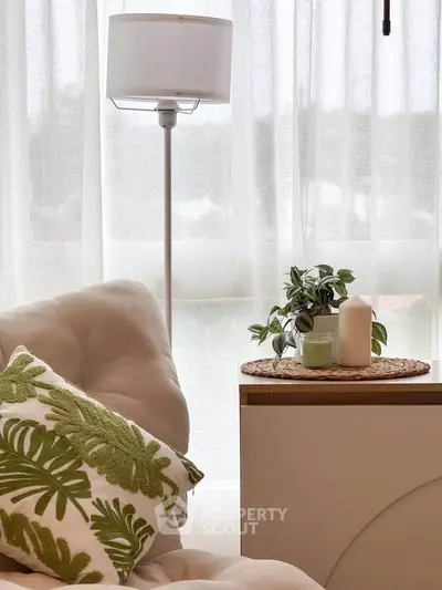 Cozy living room corner with elegant decor and natural light