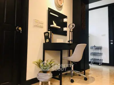 Chic home office corner with modern desk and chair, perfect for productivity.