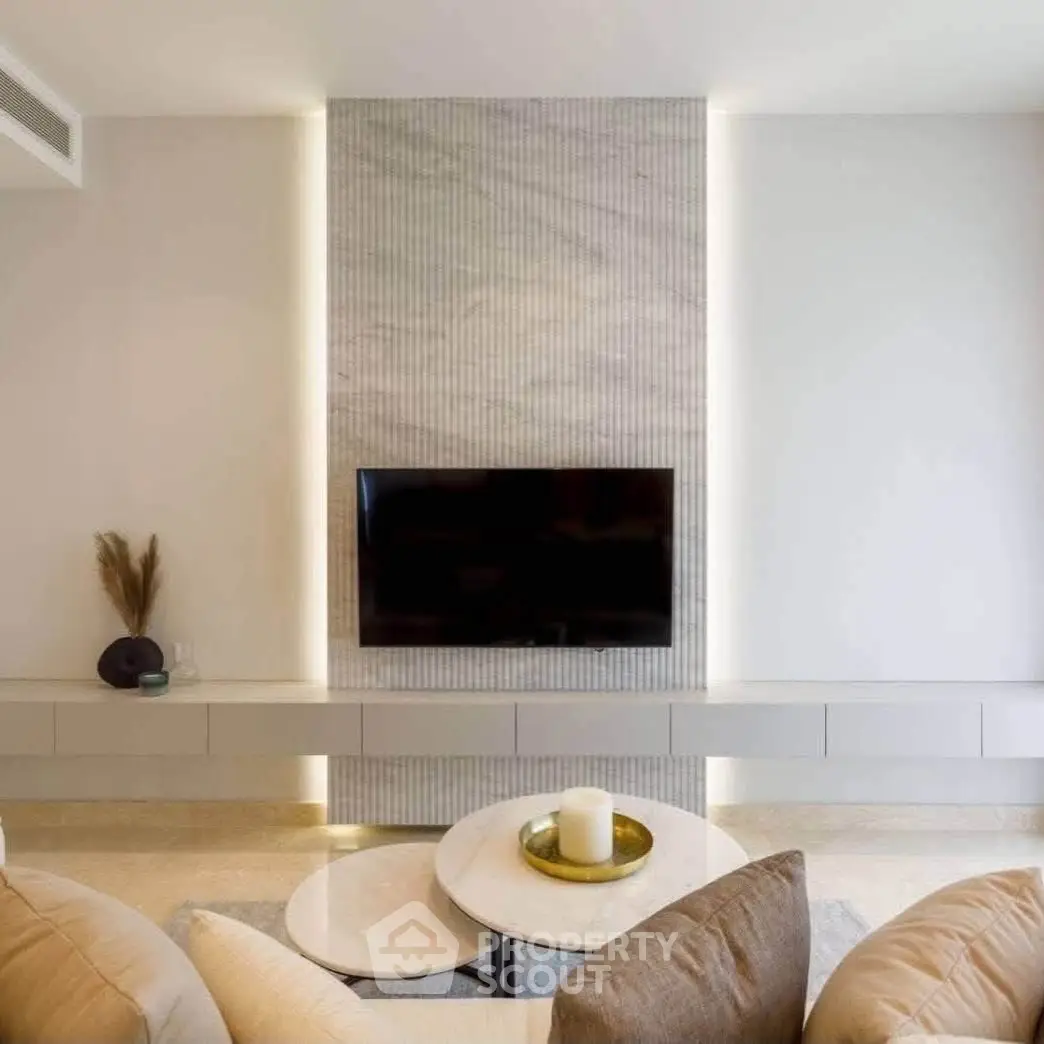 Elegant living room with modern TV setup and stylish decor