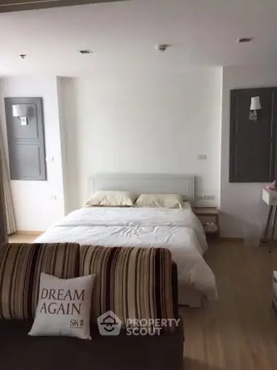 Cozy bedroom with modern decor and inviting ambiance