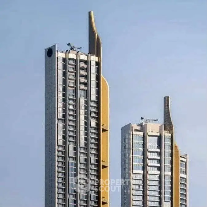 Modern high-rise buildings with sleek architectural design and glass facades.