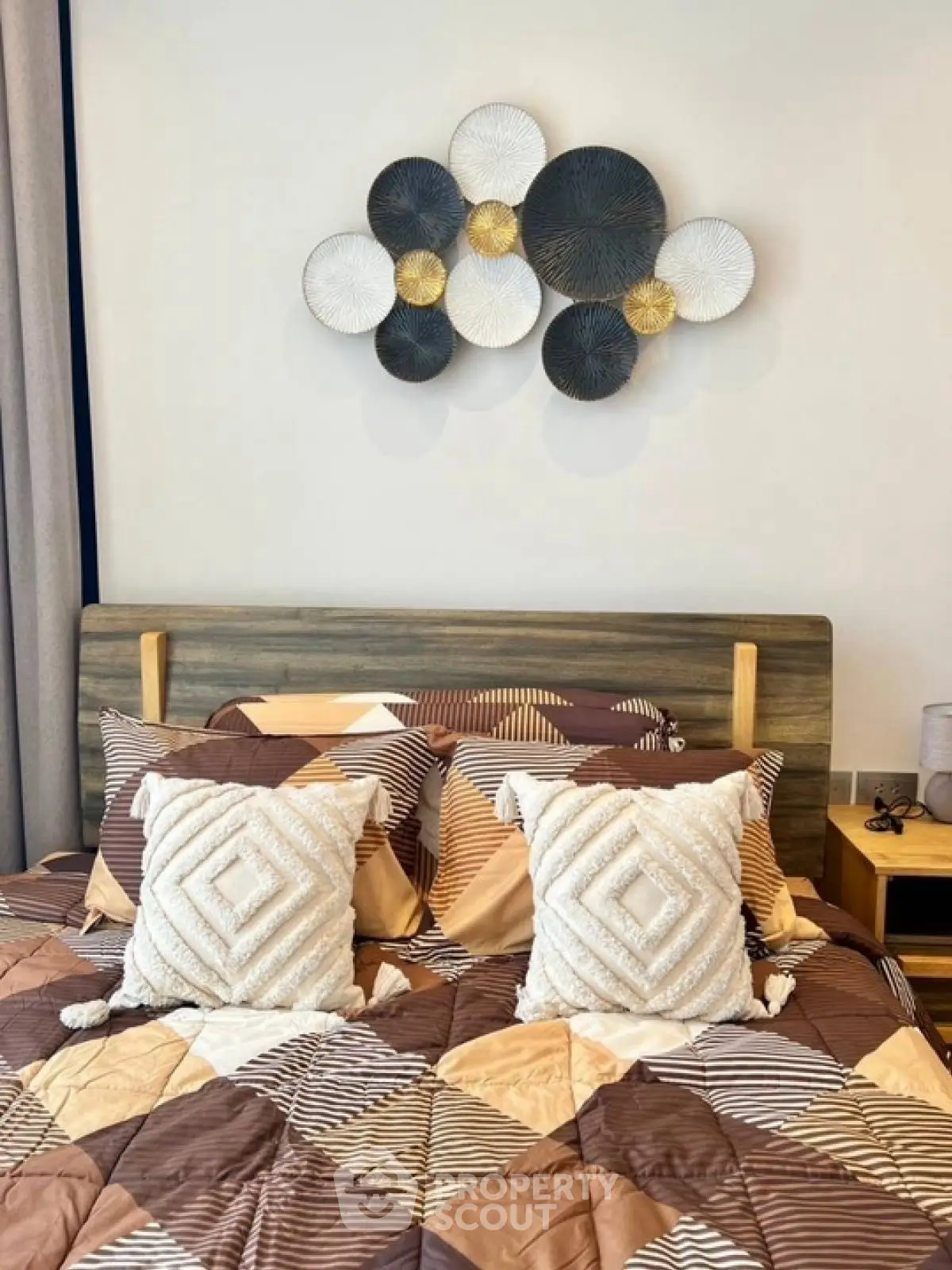 Cozy bedroom with modern decor and stylish wall art