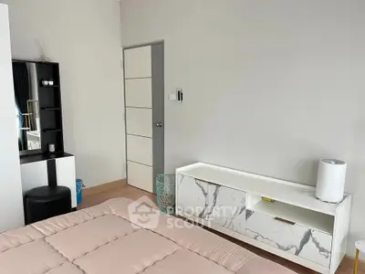 Modern bedroom with stylish furniture and neutral tones