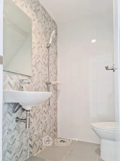 Modern bathroom with sleek design and stylish tile work