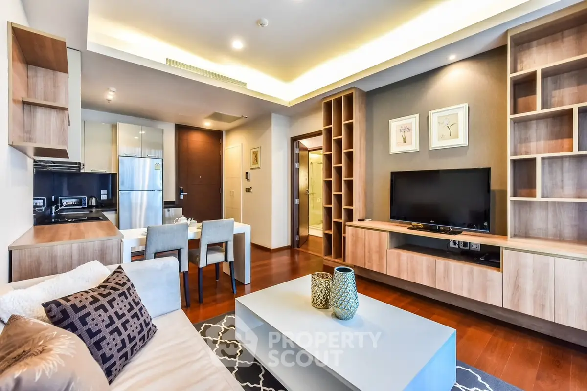 Modern living room with stylish decor and open kitchen layout in a contemporary apartment.