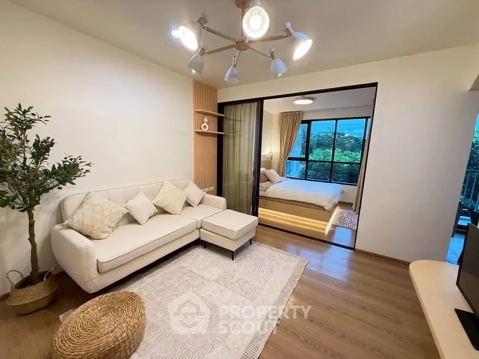 Modern living room with cozy bedroom view and stylish decor