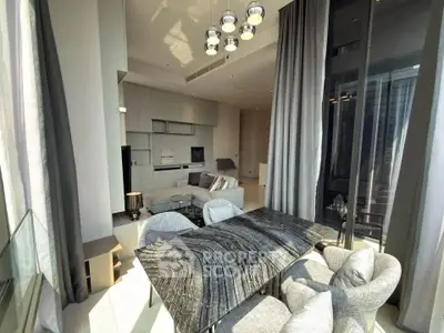 Luxurious modern living room with high ceilings and elegant dining area