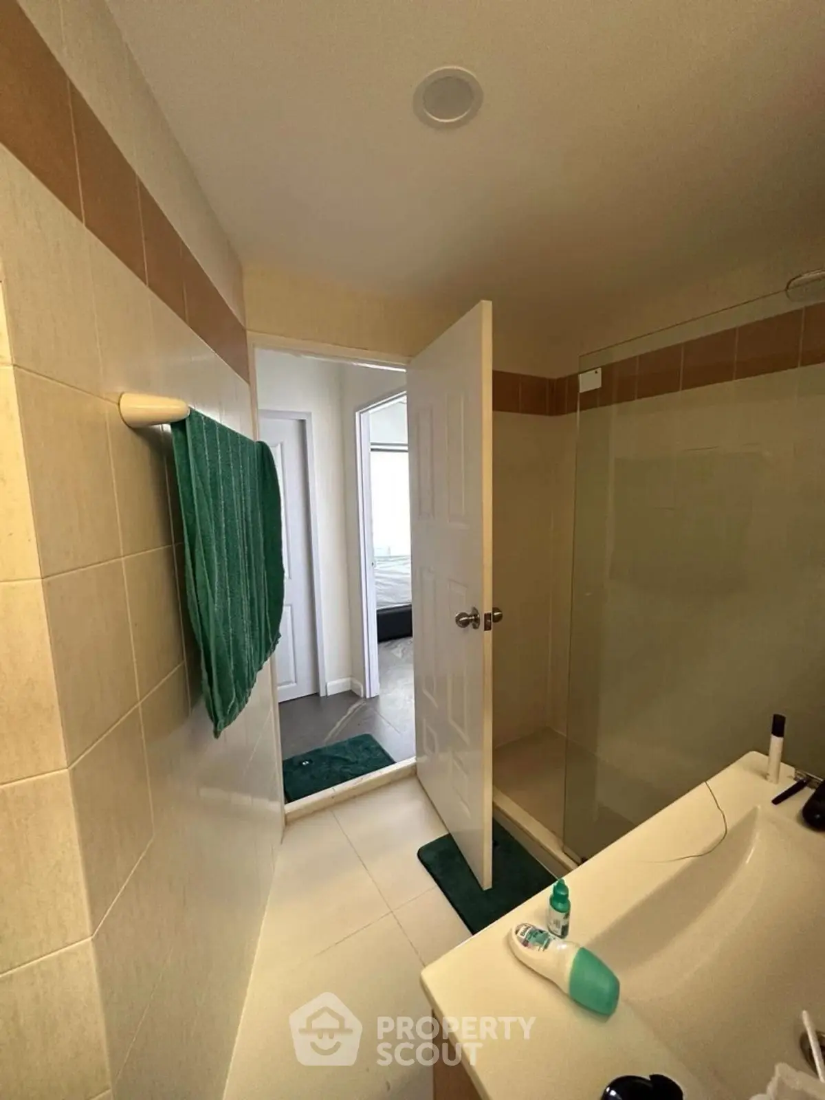 Modern bathroom with shower and sleek sink design