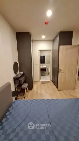 Modern bedroom with ensuite bathroom and stylish decor