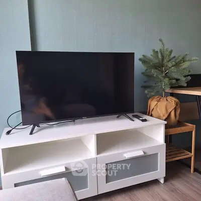 Modern living room with sleek TV setup and stylish decor