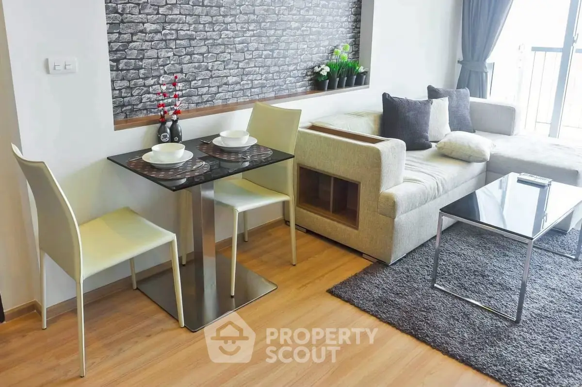 Modern living room with stylish decor and cozy seating area, perfect for relaxation and entertaining.
