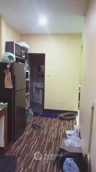 Cozy kitchen with modern appliances and wooden flooring