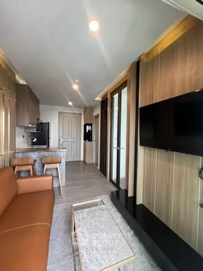 Modern living room with sleek design, open layout, and stylish furniture in a contemporary apartment.