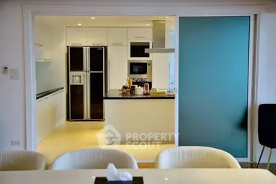 Modern kitchen with sleek appliances and open layout design