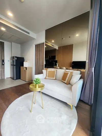 Modern living room with elegant decor and cozy seating area