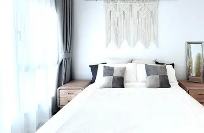 Bright and cozy bedroom with modern decor and natural light