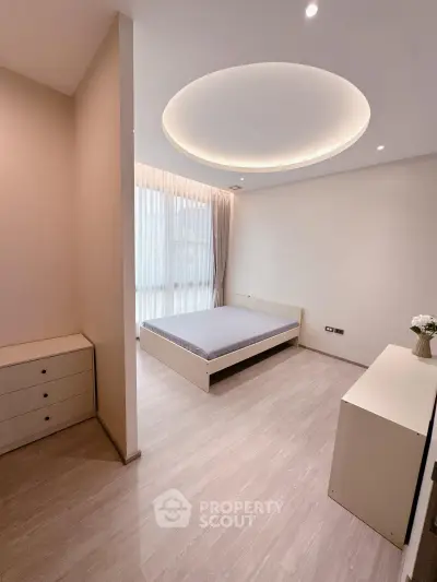Modern minimalist bedroom with sleek design and ambient lighting