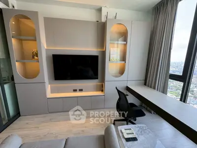 Modern living room with built-in TV unit and city view, perfect for urban living.