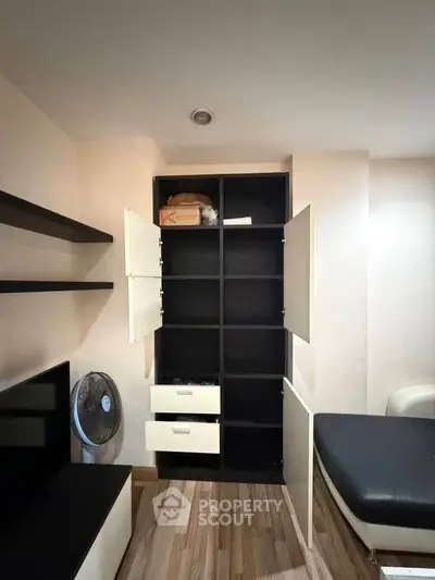 Modern apartment interior with sleek storage solutions and stylish decor