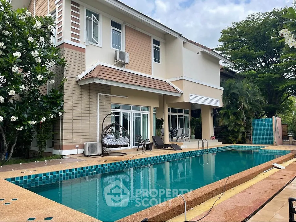 Luxurious modern home with private pool and lush garden, perfect for relaxation and entertaining.