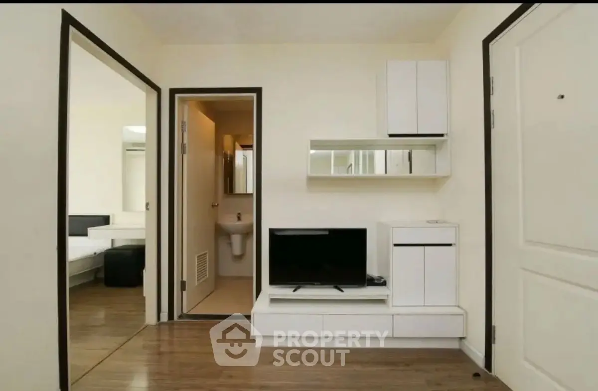 Modern apartment interior with sleek TV unit and minimalist design