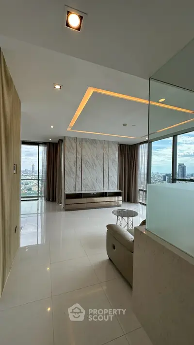 Luxurious modern living room with panoramic city views and elegant marble accents.