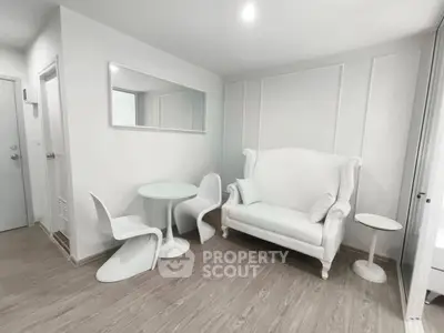 Modern minimalist living room with white furniture and elegant decor