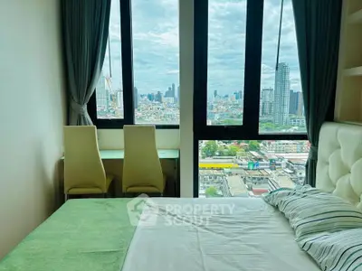 Stunning bedroom with city view, featuring large windows and modern decor, perfect for urban living.