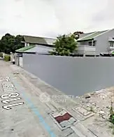 Modern residential building with green roofs and spacious layout