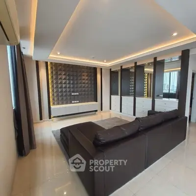 Luxurious modern living room with stylish leather sofa and elegant lighting