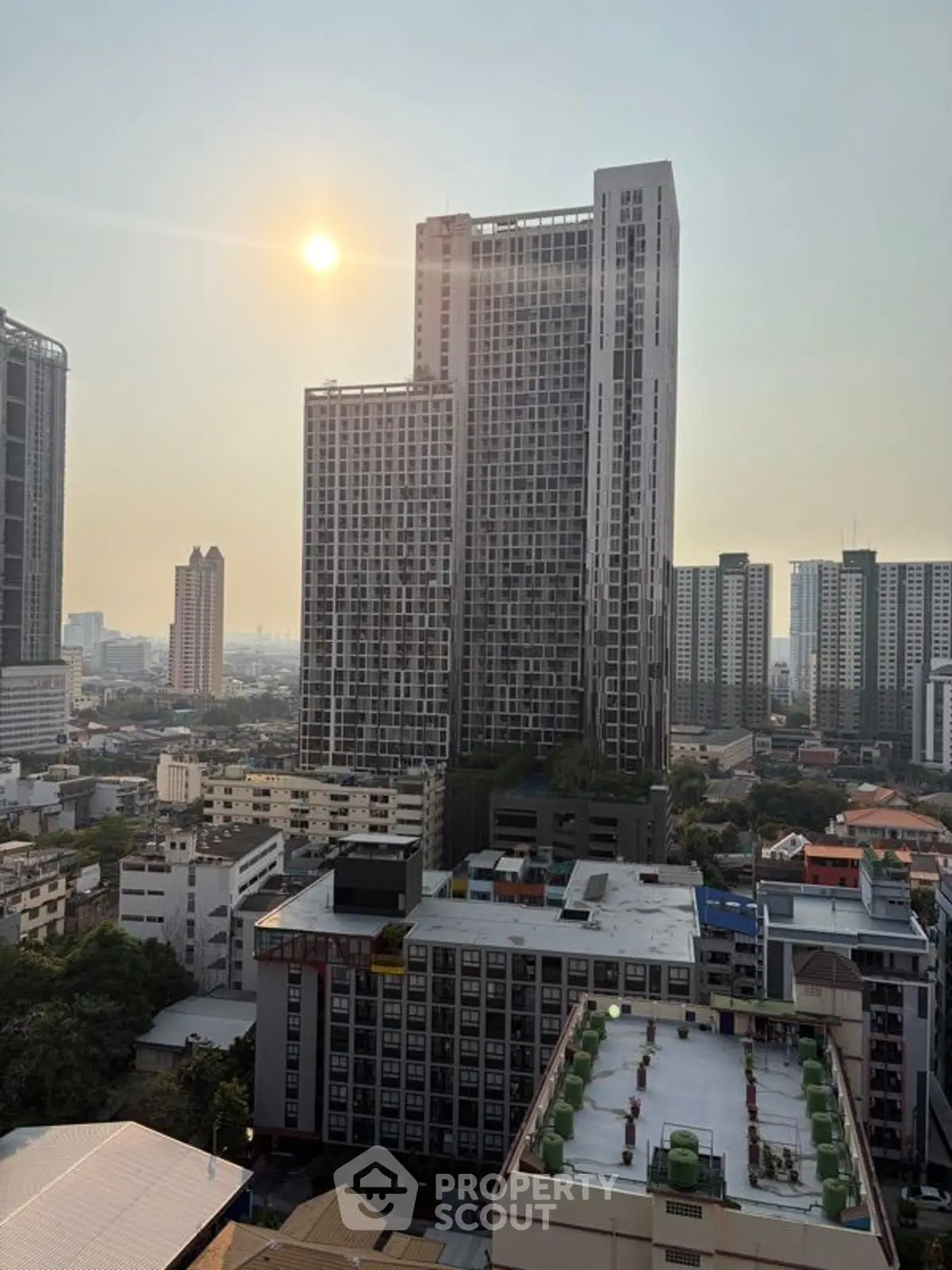 Stunning cityscape view with modern high-rise buildings at sunset