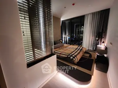 Luxurious bedroom with city view and modern decor