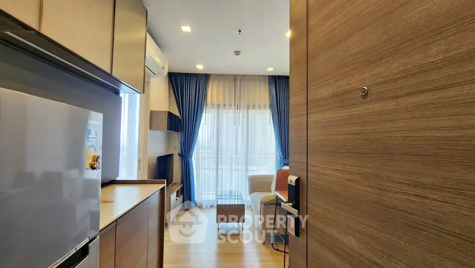 Modern apartment interior with open layout and balcony view
