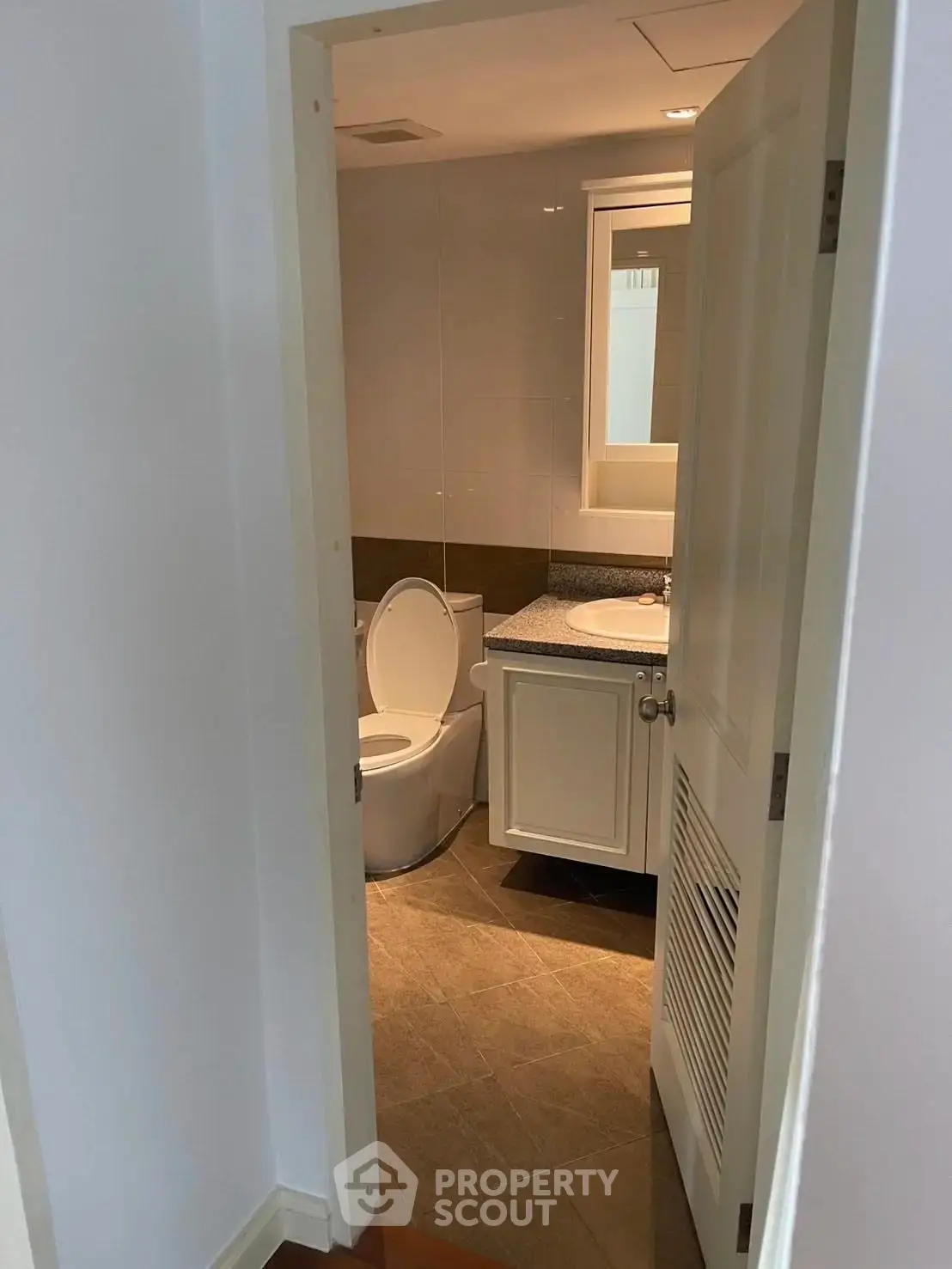 Modern bathroom with sleek design and elegant fixtures, perfect for a contemporary home.