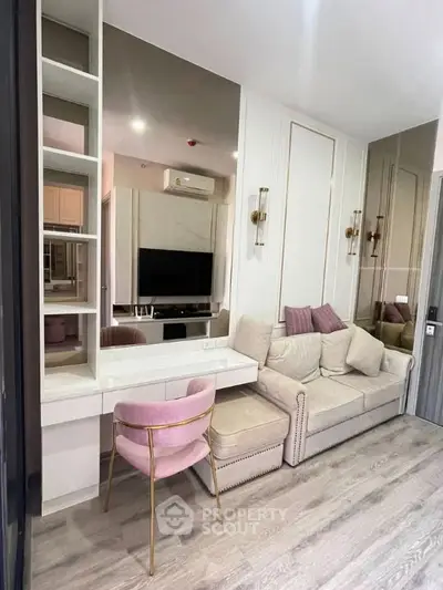 Stylish modern living room with elegant decor and cozy seating area.