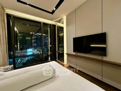 Luxurious bedroom with stunning city view and modern decor
