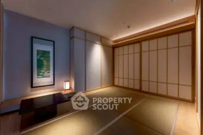 Elegant Japanese-style room with tatami mats and sliding doors, perfect for serene living.