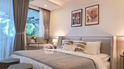 Luxurious bedroom with elegant decor and large window view