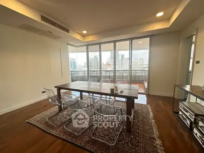 Spacious dining area with city view and elegant decor
