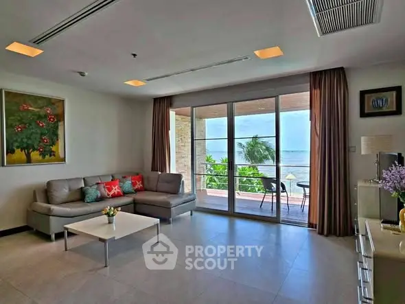 Spacious living room with ocean view and modern decor