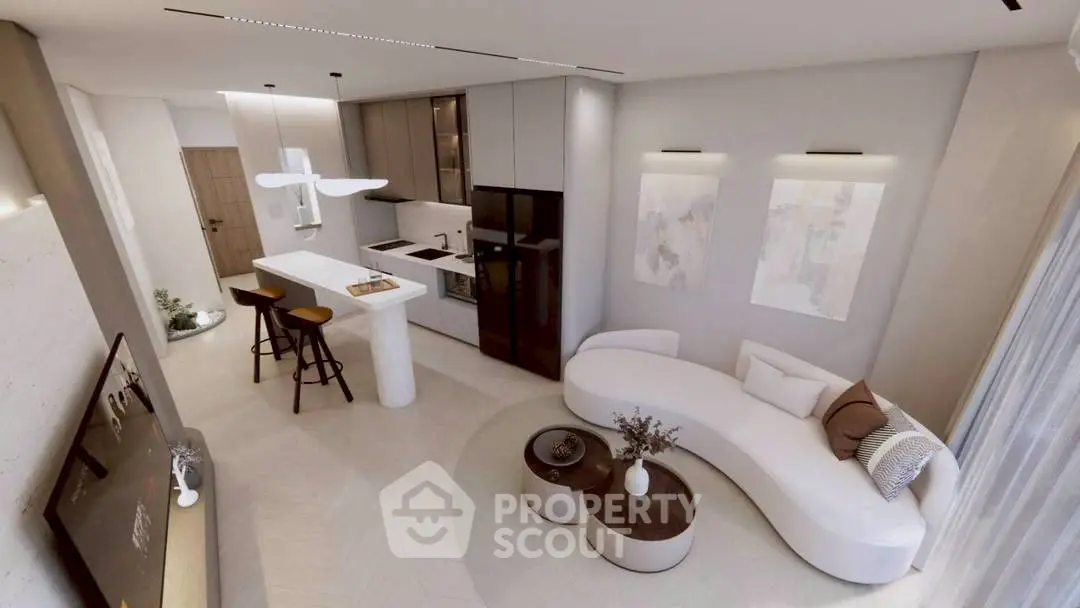 Modern open-concept living room with sleek kitchen and stylish decor.