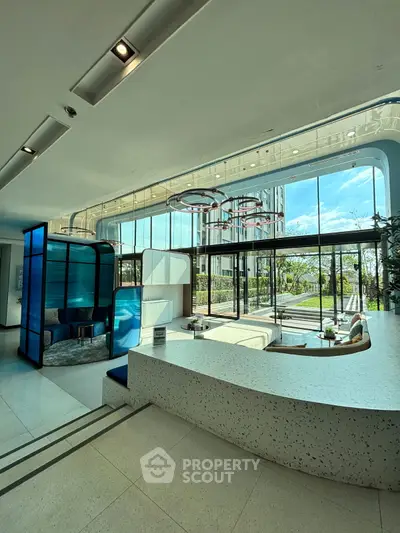 Luxurious modern living room with floor-to-ceiling windows and stylish decor