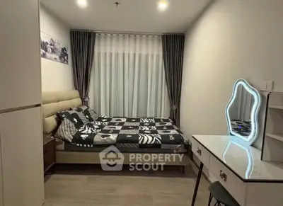 Cozy bedroom with stylish decor and modern furniture, perfect for relaxation and comfort.