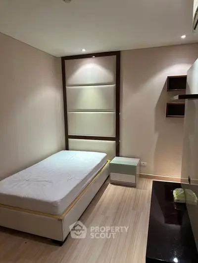 Cozy minimalist bedroom with modern design and sleek furniture