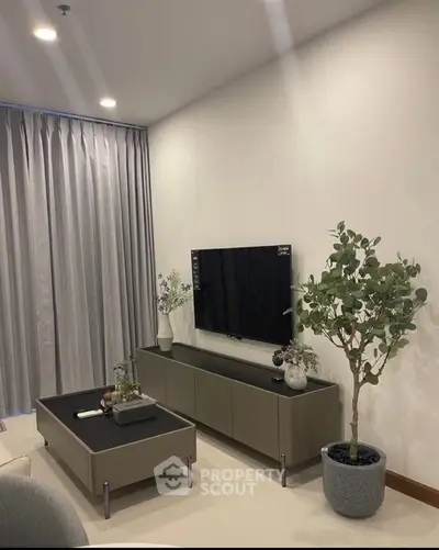 Modern living room with sleek furniture and stylish decor