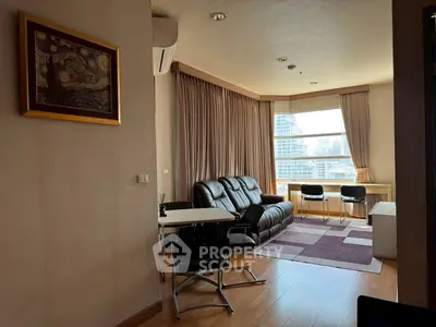 Spacious living room with city view and modern furniture